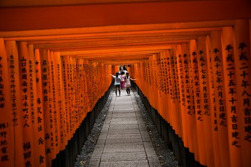 Visiting Fushimi Inari Shrine in historic Kyoto, Japan.