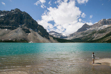 Britnee stands on the shore of Bow Lake in Banff National Park, Canada.